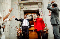 Summer wedding with red dress at The Old Marylebone Twon Hall